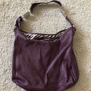 Plum color bag/purse with Zebra print interior